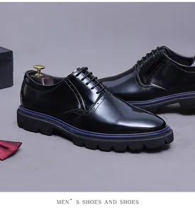 Polished black leather derby shoes with lug sole and blue midsole accents