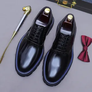 Polished black leather oxford shoes for men with unique blue welt detail and round toe
