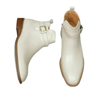 Classic cream leather men's dress boots with side buckle and zipper closure detail