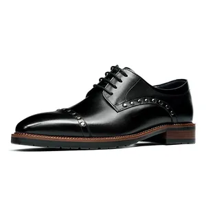 Classic black leather business shoes with silver rivet studs and lace-up oxford design