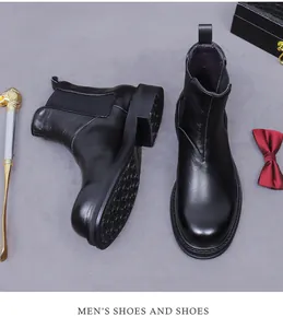 Détail de bottines Chelsea en cuir avec panneaux élastiques et semelles épaisses en gomme
