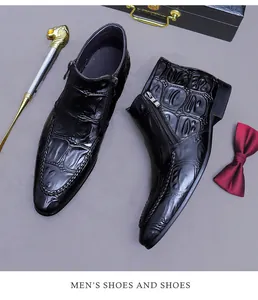 Detail of black embossed leather boots with side zipper, luxury cane, and red bowtie