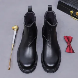 Classic black leather men's Chelsea boots with round toe and elastic side panels