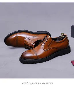 Detail of brown leather brogue shoes with cap-toe design and durable rubber sole