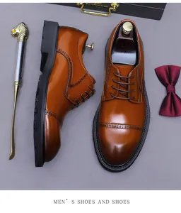 Top view of caramel brown brogue derby shoes with classic wingtip punching detail