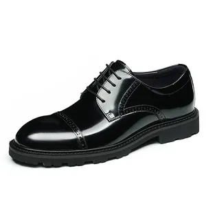 Polished black leather Derby shoes with brogue detailing and thick rubber soles
