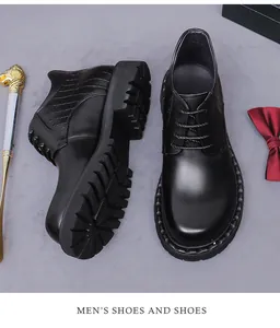 Close-up of black leather business shoes with crocodile texture and thick rubber sole