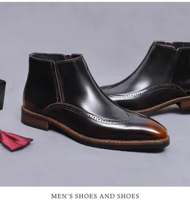 Detailansicht der braun polierten Chelsea-Boots mit feinen Brogue-Verzierungen für Herren