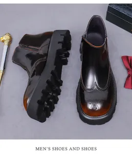 Detalle de los perforados brogue wingtip y cuero degradado en botines Chelsea
