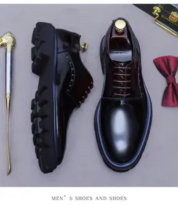 Top view of men's burgundy leather shoes with thick lug soles and elegant gift accessories