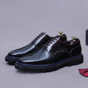 Deep burgundy gradient leather dress shoes with stud details and lace-up design