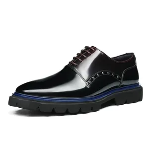 Men's leather fashion sneakers featuring color block design and stud accents on platform sole