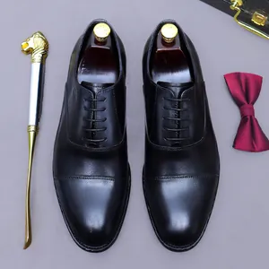 Zapatos Oxford clásicos de cuero negro con calzador y accesorios para caballeros