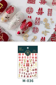 Detail of red and gold nail art stickers with traditional Chinese motifs and crane