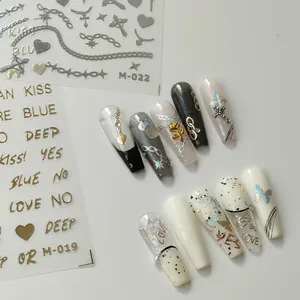 3D metallic Y2K nail art stickers with gold letters and silver chain cross designs