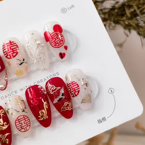 Red and white Chinese wedding press-on nails with gold crane and 3D pearl accents