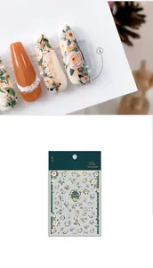 Macro detail of KX-291 camellia nail stickers with orange 5D butterfly and pearl accents