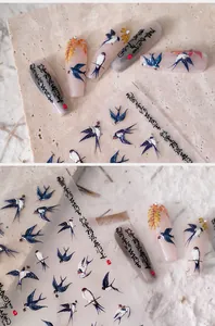 Detailed 5D thin nail stickers featuring traditional Chinese swallow and calligraphy designs
