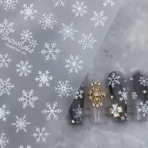 5D reliëf witte sneeuwvlok nagelstickers met getextureerde patronen op professionele nagels