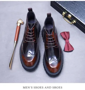Λεπτομέρεια από ανδρικά μποτάκια brogue με διαβαθμισμένο καφέ δέρμα και διάτρητο σχέδιο