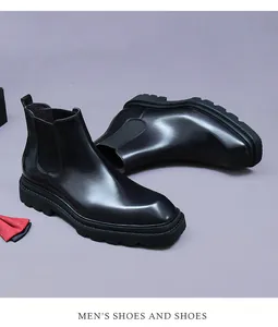 Detail of premium black leather Chelsea boot with thick non-slip sole and elastic side panel