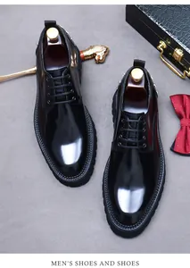 Macro view of men's patent leather derby shoes with thick non-slip soles and rivet detail