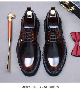 Flat lay of oxblood leather derby shoes with thick rubber soles and elegant accessories