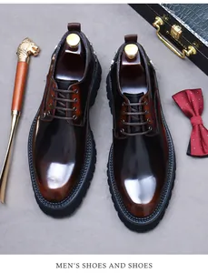 Polished brown leather derby shoes displayed with luxury business accessories