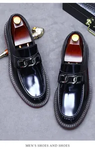 Polished leather loafers for men with metal chain detail and classic shoe trees