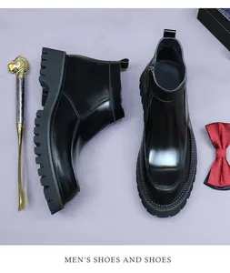Close-up of shiny black leather boots with side zipper and thick anti-slip sole