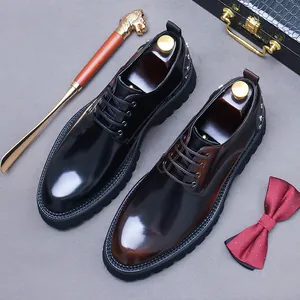 Polished leather derby shoes for men with thick lug soles and metal skull studs
