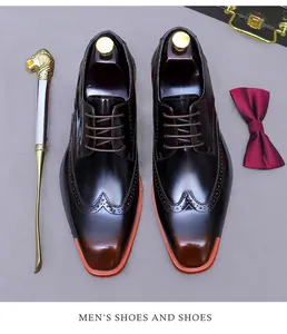 Top view of premium dark brown wingtip oxfords with leather gloss and accessories