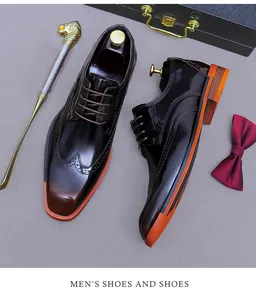 Detailed top view of men's burgundy oxfords with brogue details and leather texture