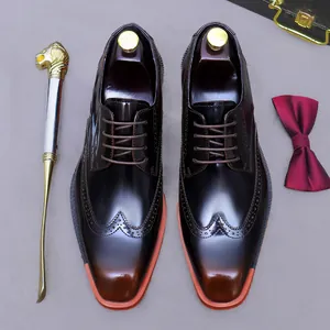 Polished burgundy gradient leather Oxford shoes with brogue detail and square toe design