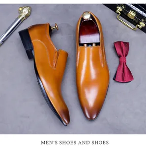 Brown leather oxfords with lion head cane and professional business accessories
