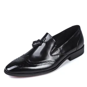 Classic black leather brogue tassel loafers for men with elegant wingtip detailing
