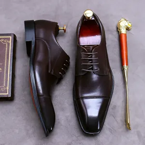 Men's dark brown leather cap toe oxford shoes with luxury shoe horn and trees