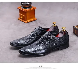 Detailed close-up of black crocodile-embossed leather monk strap shoe with cedar tree