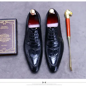 Top view of black crocodile pattern leather oxford shoes with premium wooden shoe trees