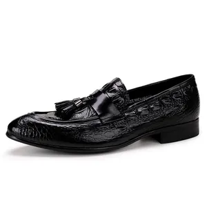 Men's black genuine leather loafers with crocodile embossing and tassel accents