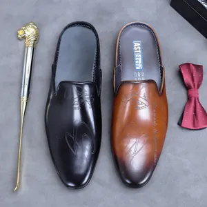 Formal leather mule loafers for men in black and gradient brown with artistic embossing