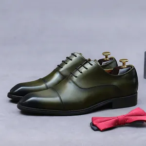 Formal olive green and black leather Oxford shoes for men with classic lace-up design