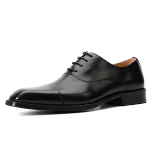 Classic black leather Oxford shoes for men with polished finish and five-hole lace-up design