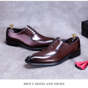 Detailed macro view of dark brown leather dress shoes with professional burnished finish