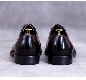 Rear view showing polished leather texture and heel of classic men's formal dress shoes