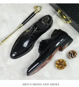 Macro view of polished black patent leather men's oxford shoe with brown wooden sole