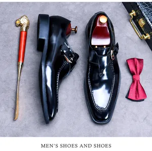 Classic black leather monk strap shoes with glossy finish and premium buckle detail
