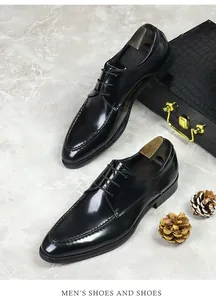Detail view of premium black patent leather derby shoes with classic lace-up design