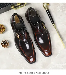 Close-up of premium reddish-brown leather monk strap shoes with polished patina finish