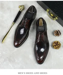 Detail of burgundy glossy leather derby shoes with U-shaped moccasin stitching details